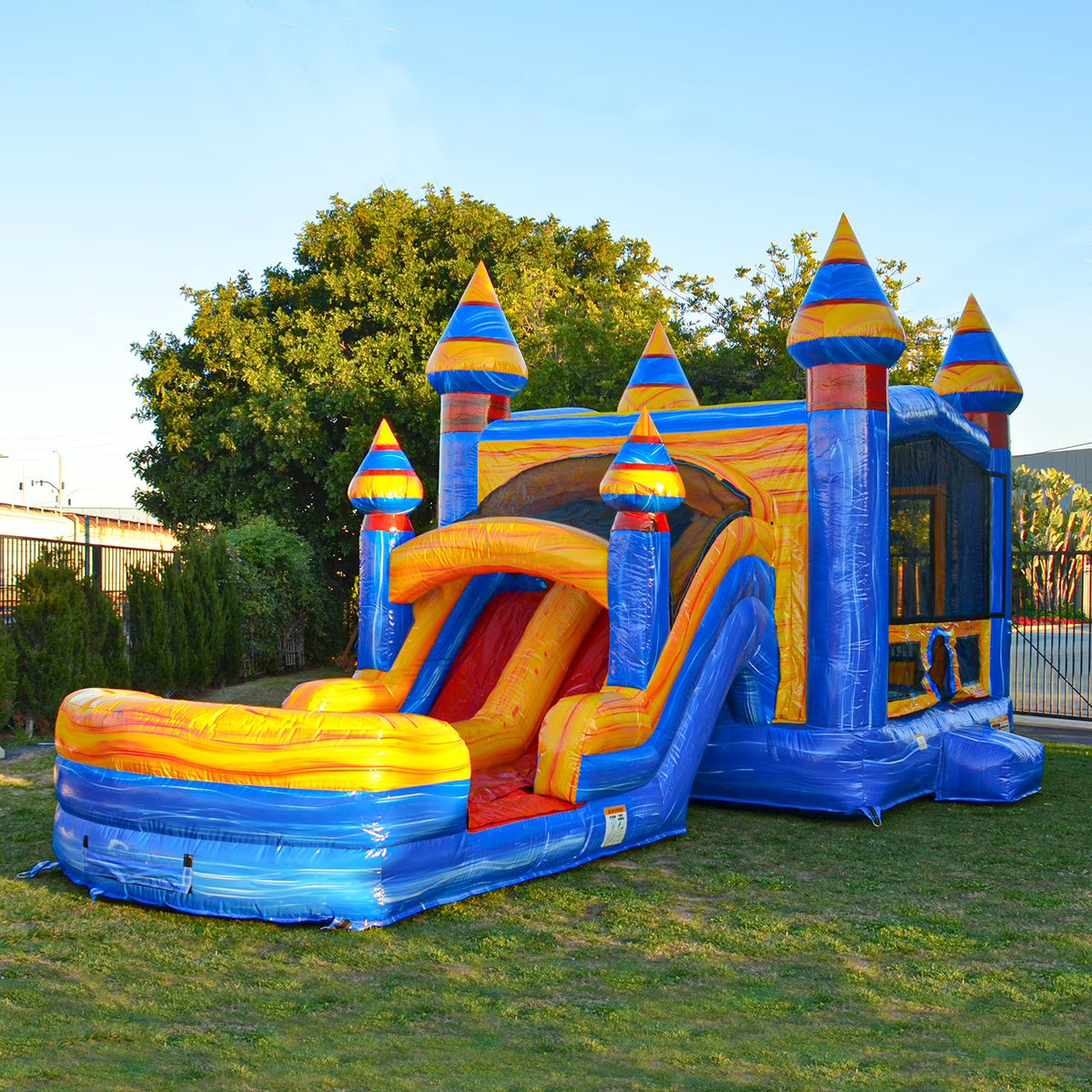 Inflatable Bounce with Two Slides, Heavy Duty Blower, Stakes and Storage X60577